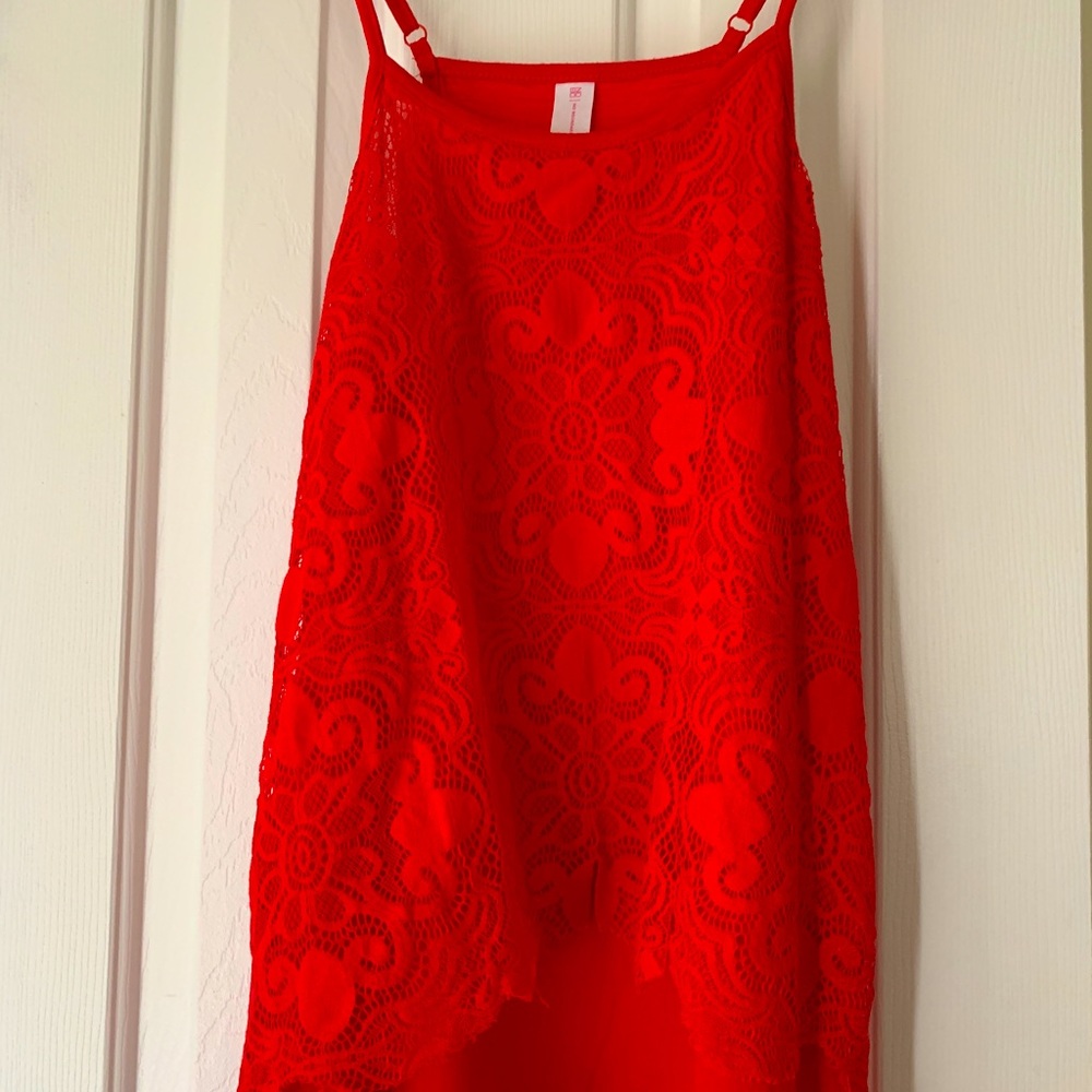 *SOLD*Cute Red tank top with adjustable straps. Very pretty design in the front.